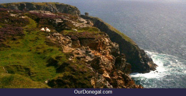 Historic Watchtower Dwarfed By Slieve League Cliffs